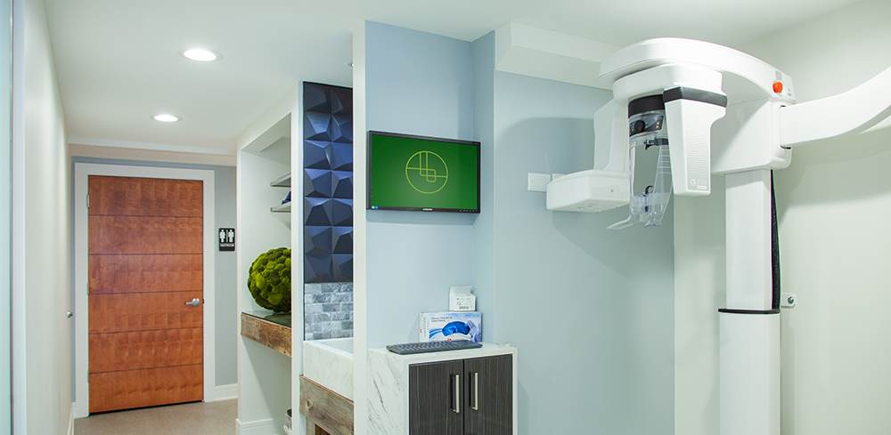 The imaging room with a panoramic X-ray unit.